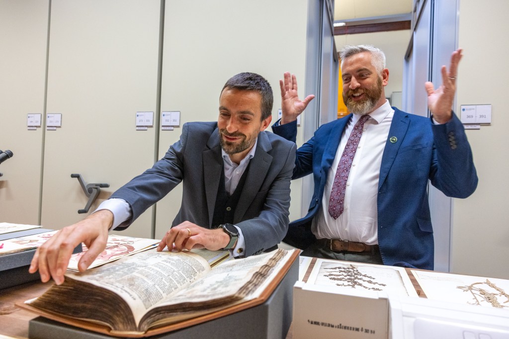 Pictured Minister of State for Nature, Heritage and Biodiversity, Christopher O’Sullivan TD and Curator of Trinity College Dublin Herbarium, Dr Peter Moonlight, from Trinity’s School of Natural Sciences.